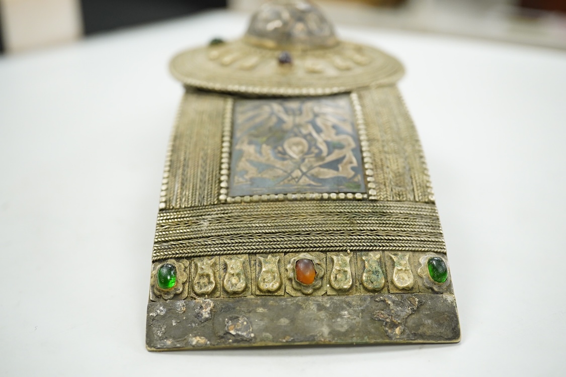 A niello work belt buckle, 21cm wide, an Arab white metal cloak brooch and a powder flask
